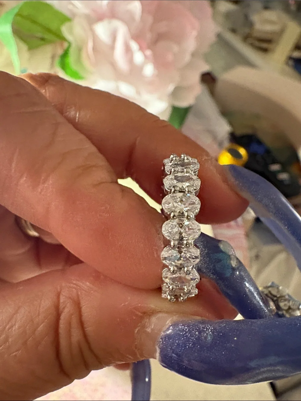 Classic Rhodium Cubic Zirconia Halo Eternity Band oval cut.